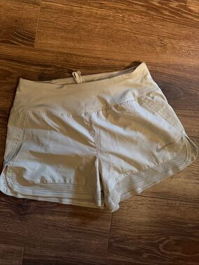 Nike Women's Light Beige Athletic Shorts with Mesh Trim
